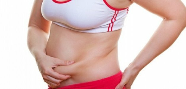 Causes et origine de la prise de ventre à cause d'une alimentation trop riche, un manque d'exercices et un stockage des graisses
